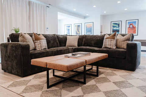 Down to Earth Projects | Eden Residence - grey corduroy sofa in family room 