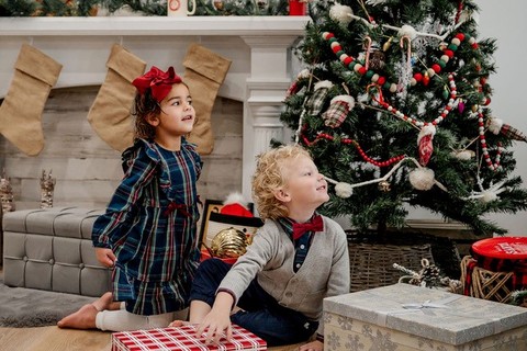 Storybook Nook  - boy and girl in children's christmas clothing 
