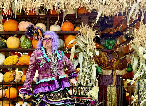 Gardner Village Witch Displays - witch by pumpkin house with witch display 