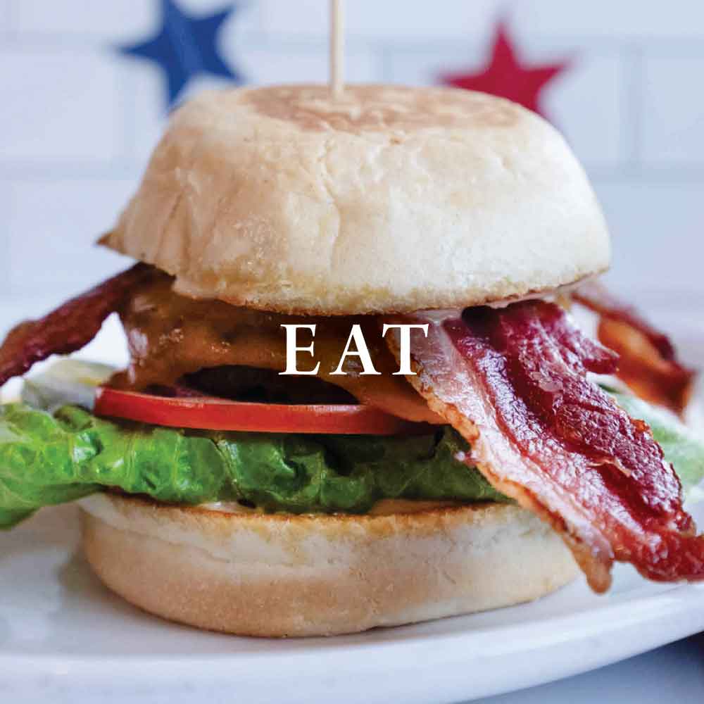 eat a hamburger at archibalds restaurant